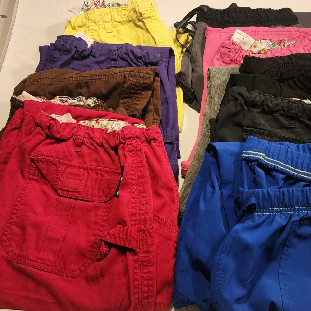 9 pair of size medium scrub pants
